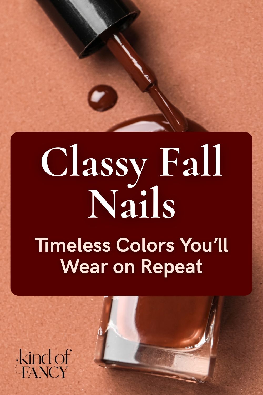classy fall nails with a deep brown nail polish bottle and brush spilling out a color swatch of the shade on a rust, copper background