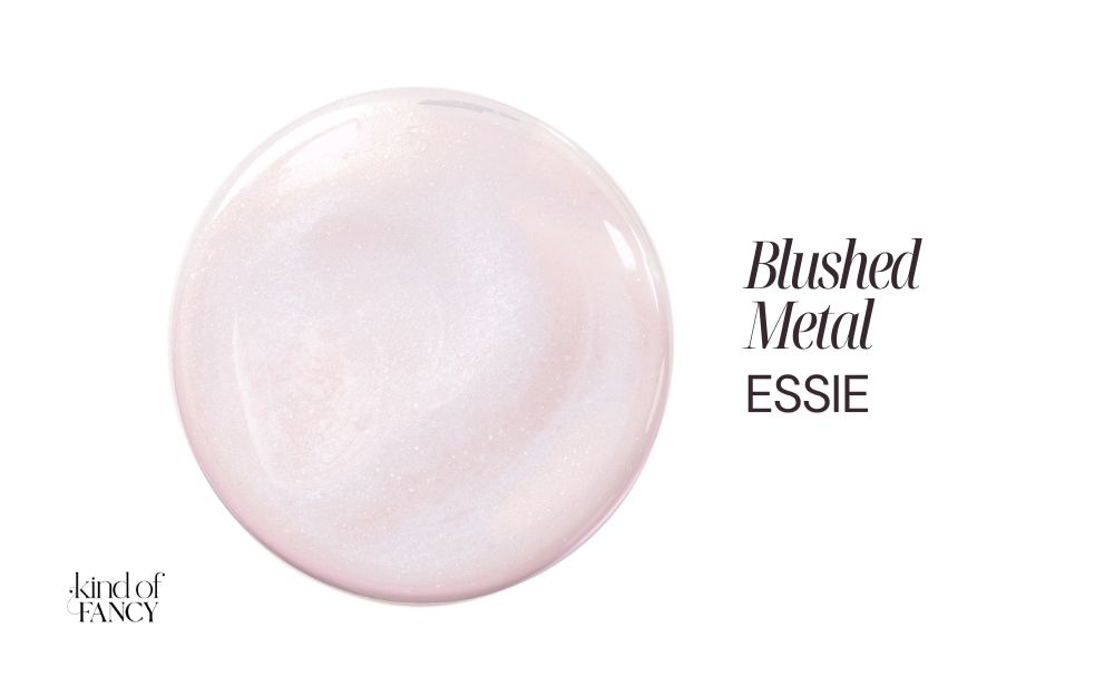 Essie Blushed Metal nail polish swatch, a brushed rose-pearl with a soft-focus finish perfect for elegant winter nails.