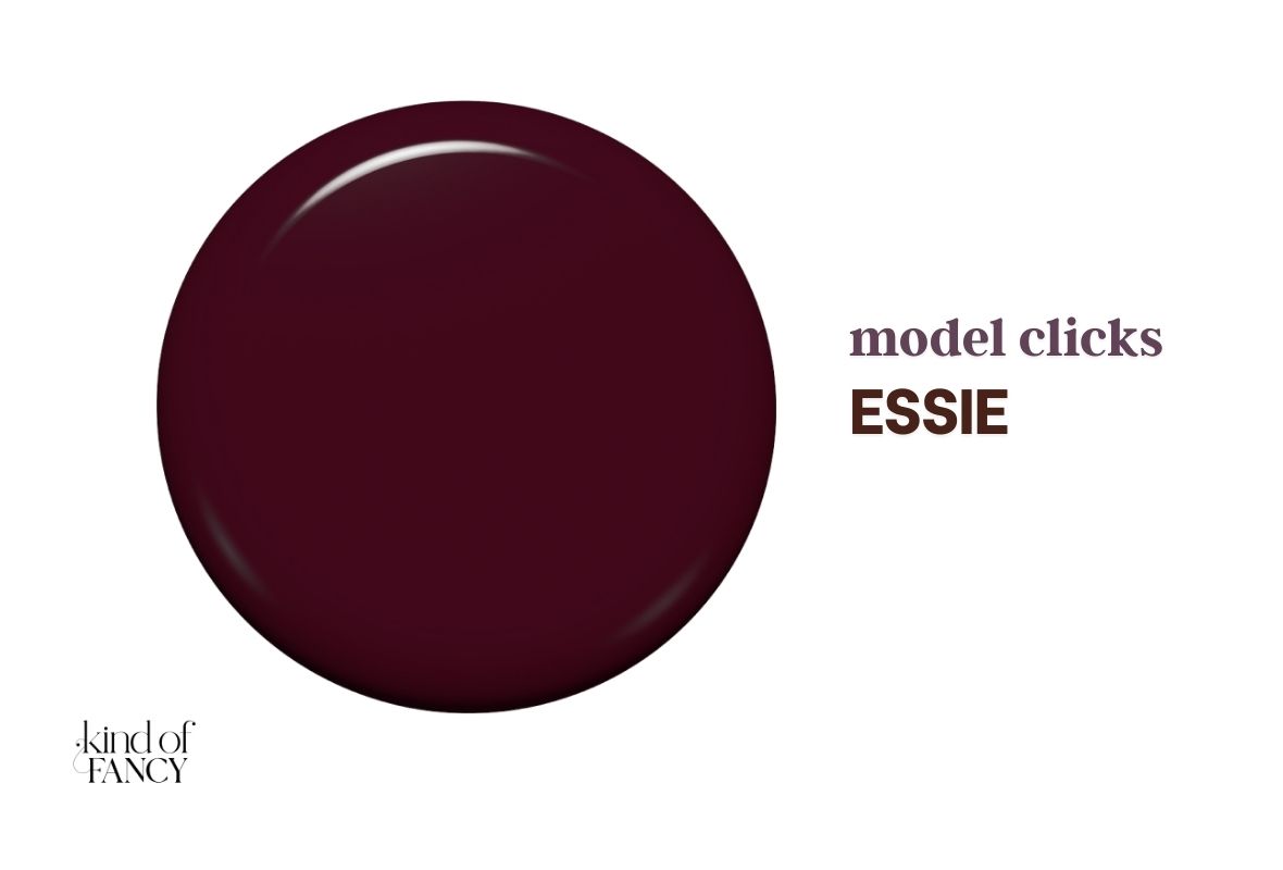 Swatch of essie Model Clicks, 
deep blackberry-wine nail polish swatch with a rich velvet finish, an elegant dark winter nail color.