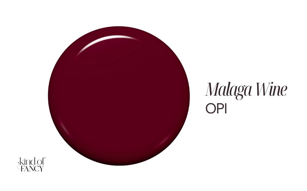 OPI Magala Wine nail polish swatch, a deep berry-wine shade with rich, velvety depth, perfect for elegant winter manicures.
