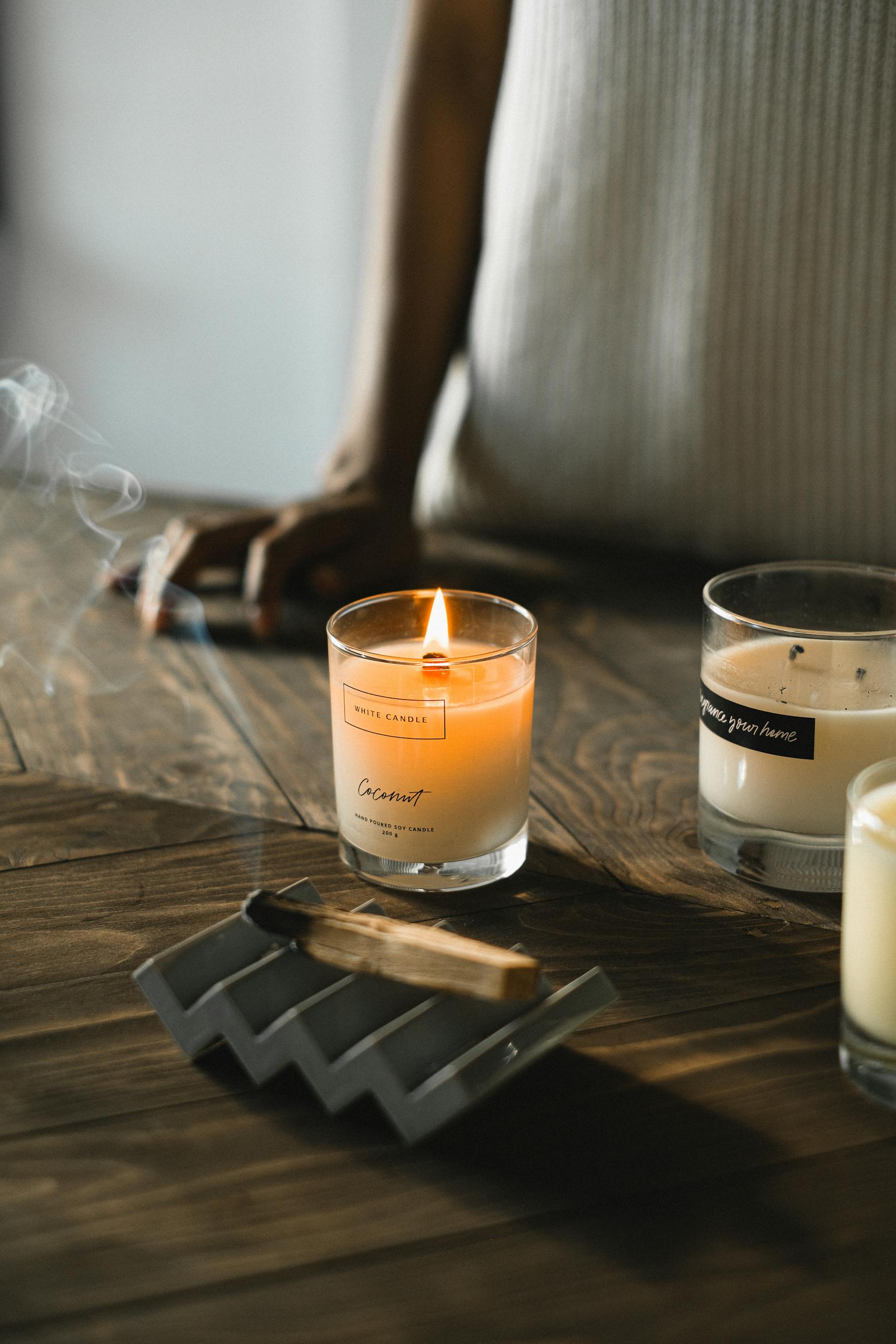 Candle gifts-Warm and tranquil ambiance with lit candles and incense, perfect for candle snobs.