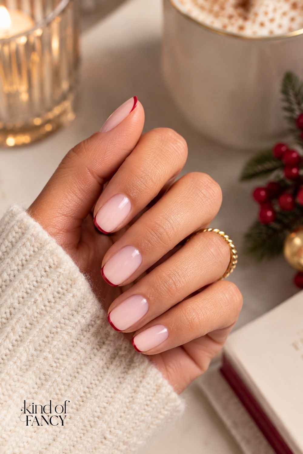Pink Christmas manicure with a fine red micro French tip
